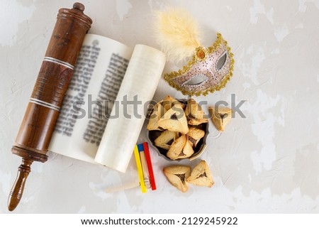 The Scroll of Esther and Purim Festival objects Royalty-Free Stock Photo #2129245922