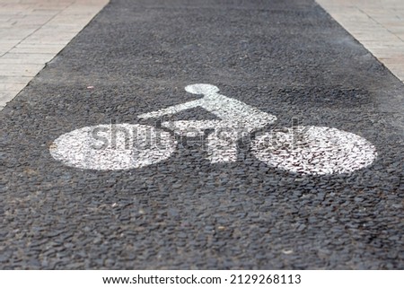 Bike path (lane) signalisation on the ground, Marseille, France.