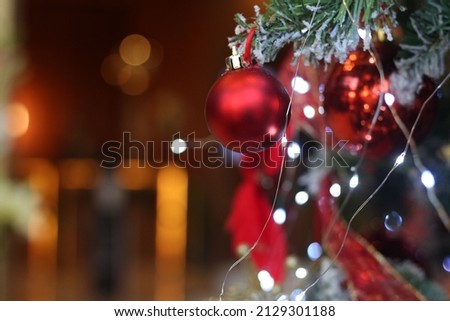 red ball of christmas tree golden background