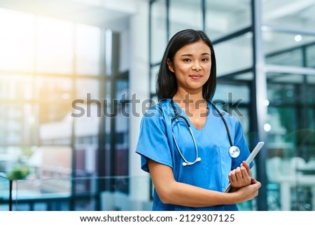 Your health is fundamental to me. Portrait of a young nurse standing in a hospital. Royalty-Free Stock Photo #2129307125
