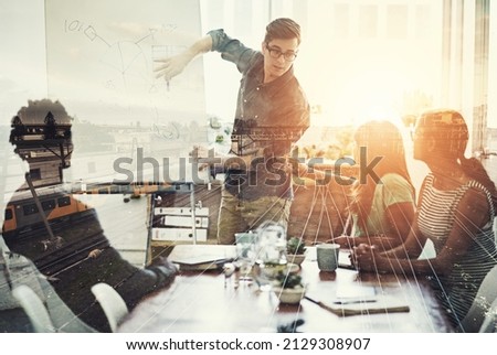 They are right on track. Multiple exposure shot of a business group superimposed over a train track. Royalty-Free Stock Photo #2129308907