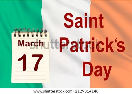 The celebration of the Saint Patrick Day with the Irish flag and the calendar indicating the March 17