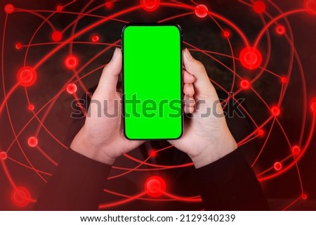 Smartphone with green screen and dangerous red link background.
