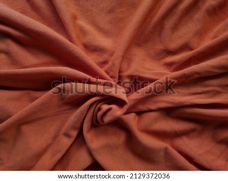 Orange color t-shirt abstract background