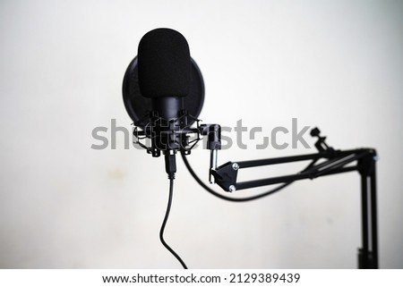 Voiceover microphones are used for recording speech that overlays upon an audio track of a films or videos.              