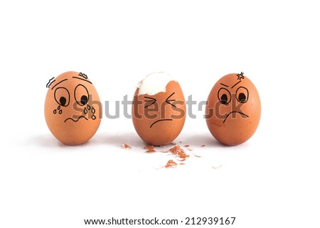 three eggs with cute face isolated on white background