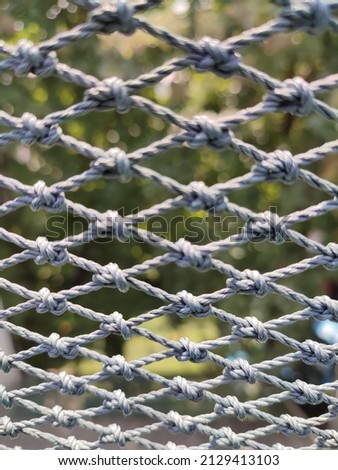 Net string pattern and texture in playground for safety with bokeh and blurry background