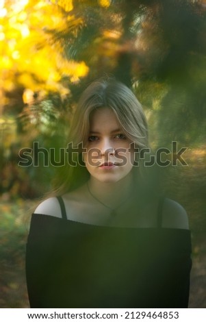 Portrait of a girl in the park. Beautiful girl. 