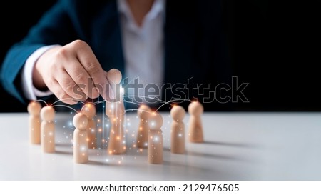 woman touch wooden Human resources officer looking for leader and CEO concept, Leader leave his comfort zone and get out of the crowd. Personal development, motivation and challenge. Royalty-Free Stock Photo #2129476505