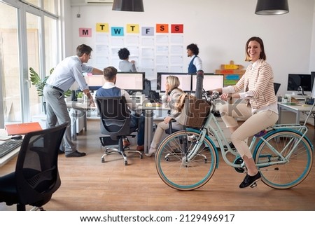 Environmentally focused workplace with happy employees concept