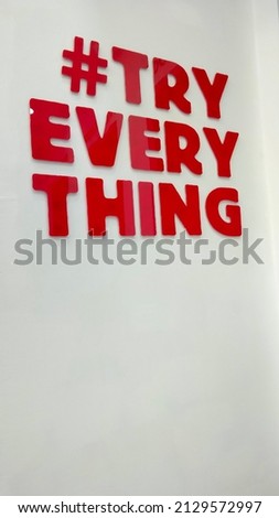 Red writing on a white wall at noon. Great for symbols, business, backdrops, promotions and more.