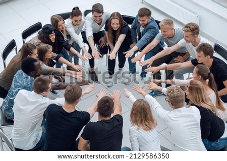 group of diverse young people in a teambuilding class. Royalty-Free Stock Photo #2129586350