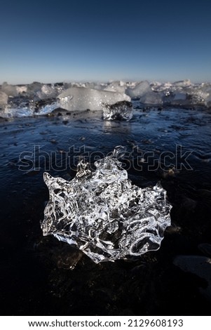 Picture of a shiny ice formation on the Diamond beach in the Jokulsarlon lagoon in Iceland