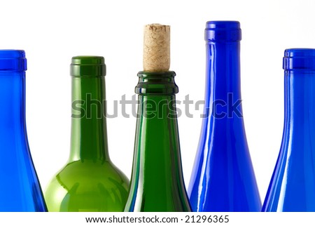 Color transparent wine bottles as background