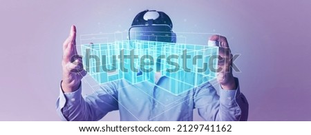 Augmented reality technology. Architect or Engineer designer wearing VR headset for BIM technology working design 3D house model. Architect working with metaverse technology concept. Royalty-Free Stock Photo #2129741162