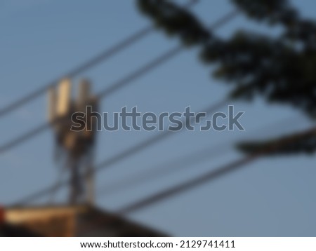 blurred gray communication towers used as a background