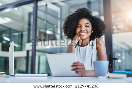 With apps like these your business will flourish. Cropped shot of an attractive young businesswoman working in her office. Royalty-Free Stock Photo #2129745236