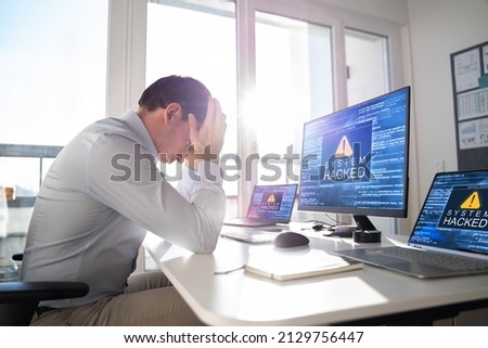 Ransomware Malware Attack. Business Computer Hacked. Security Breach Royalty-Free Stock Photo #2129756447