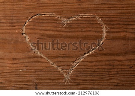 Heart shape cut on wood