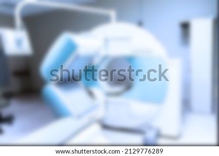 Magnetic resonance imaging MRI, medical diagnostic device, x-ray computer, computed tomography CT scan, axial tomography in a modern clinic. Soft toned blurred background. High quality photo