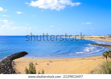 View at the Playa Del Ingles beach with the dunes in the background, Gran Canaria - Spain Royalty-Free Stock Photo #2129812697