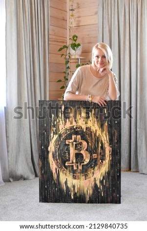 Oil painting golden bitcoin. woman artist and modern pop cryptoart. bitcoin symbol drawing. sale of paintings