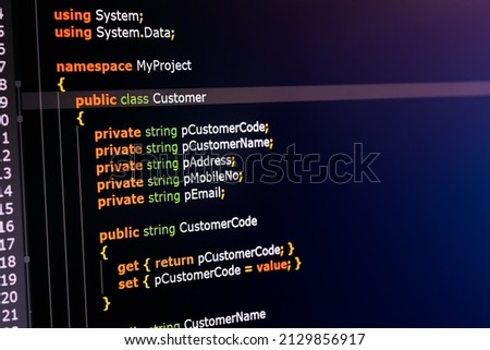 C sharp programming language source code example on monitor, C# source code. Royalty-Free Stock Photo #2129856917
