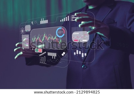 Dashboard Application on screen with businessman analytics data, charts and graphics  Royalty-Free Stock Photo #2129894825