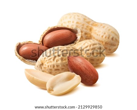 Handful of peanuts in nutshell isolated on white background. Whole nuts and peeled kernels. Package design element with clipping path Royalty-Free Stock Photo #2129929850