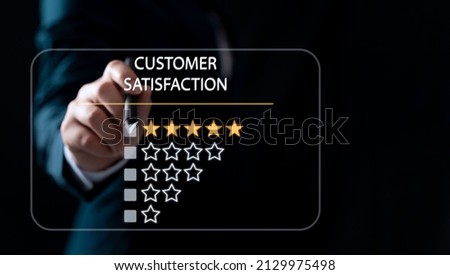 Businessman giving rating with 5 star, Customer service and Satisfaction ,Business people man giving Feedback via the Internet. Positive Review. Client Satisfaction Surveys