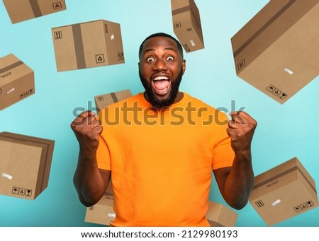 Black man is happy to receive a lot of packages