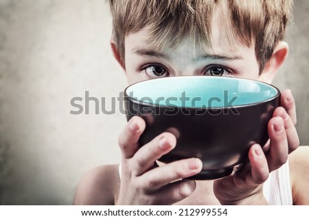 Hunger. Shallow focus Royalty-Free Stock Photo #212999554