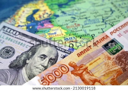 US dollars and russian rubles on map of Russia and Ukraine. Concept of USA and european sanctions during war Royalty-Free Stock Photo #2130019118