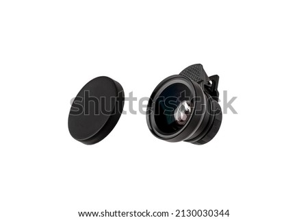 External additional lens for smartphone. Small lens for mobile phone. Mobile photography. Isolate on a white background.