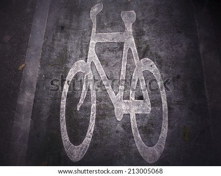 Grunge old Black and white Bike lane symbol Sign of bicycle on path with special vintage retro filter effect