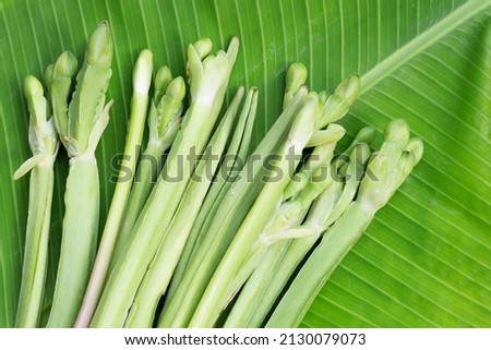 Limnocharis flava on banana leaf
