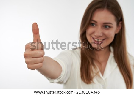 girl on a white background shows like class