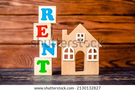  Wooden home and text on the cubes rent