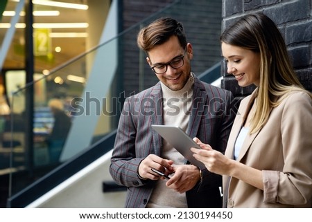 Successful business people, designer enjoying work together. Business people tecgnology concept Royalty-Free Stock Photo #2130194450