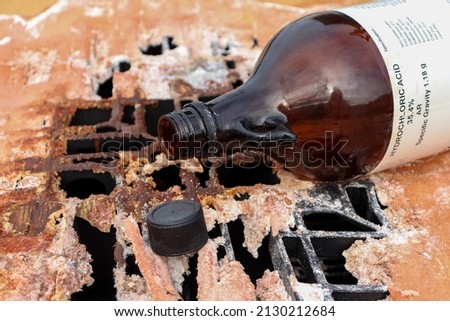 Hazardous chemicals spill onto objects and cause corrosion, Chemicals used in industry or in laboratory Royalty-Free Stock Photo #2130212684