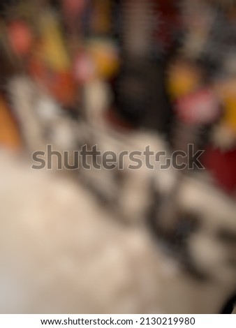 Defocused abstract background of many guitars displayed on the shelf