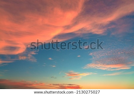 Sky at sunset texture background overlay. Dramatic red, orange, purple clouds. High resolution photography perfect for sky replacement