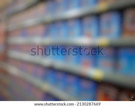 Defocused abstract background of blue cans of wafer in the display