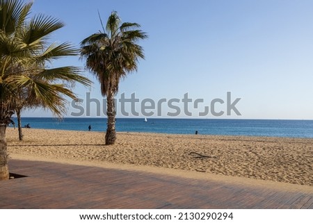 Sunny day in Badalona Beach in Spain. Royalty-Free Stock Photo #2130290294