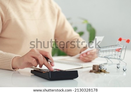  Women calculate food money with pen, paper, and calculator at home. Budget of disadvantaged and low-income families.high daily expenses. Debt, inflation and economic crisis Concept.





 Royalty-Free Stock Photo #2130328178