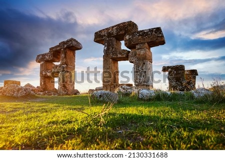 Blaundus ruins in Ulubey district of Uşak. Ancient city ruins of the Roman Empire. Historical ruins at sunset. The ancient city was in the Roman province of Lydia. Usak, Turkey. Royalty-Free Stock Photo #2130331688