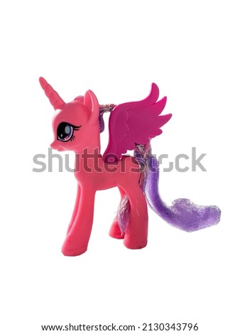 toy unicorn with wings isolated on white background