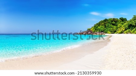 Panorama of beautiful beach and blue sky in Similan islands near Phuket, Thailand. Vacation summer holidays background. Panoramic view of nice tropical beach in Thailand.