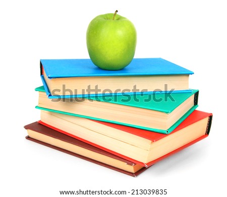 Books and an apple. On a white background.