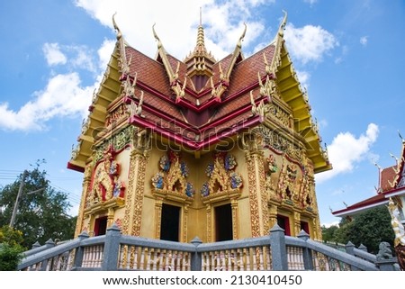 Buddhist pagoda buildings and blue sky background in Wat Khoa Noi Temple. Thailand	

